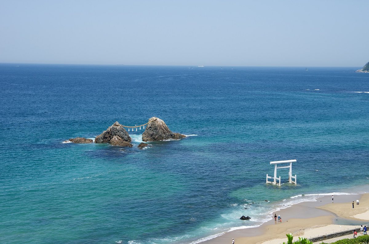 The white torii standing on the shore at Futamigaura, Itoshima